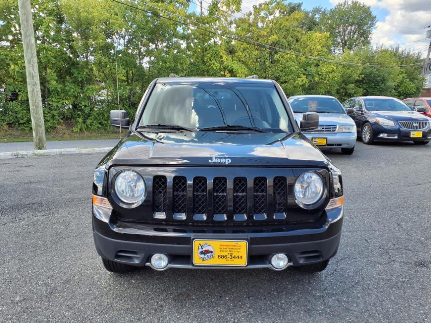 2016 Black Clear Coat Jeep Patriot High Altitude (1C4NJRFB3GD) with an 2.4L 4 Cylinder Sequential-Port F.I. engine, AWD transmission, located at 50 Eastern Blvd., Essex, MD, 21221, (410) 686-3444, 39.304367, -76.484947 - Photo#7