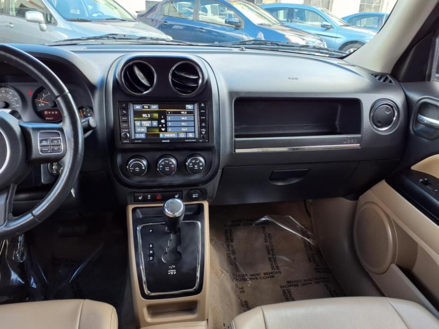 2016 Black Clear Coat Jeep Patriot High Altitude (1C4NJRFB3GD) with an 2.4L 4 Cylinder Sequential-Port F.I. engine, AWD transmission, located at 50 Eastern Blvd., Essex, MD, 21221, (410) 686-3444, 39.304367, -76.484947 - Photo#15