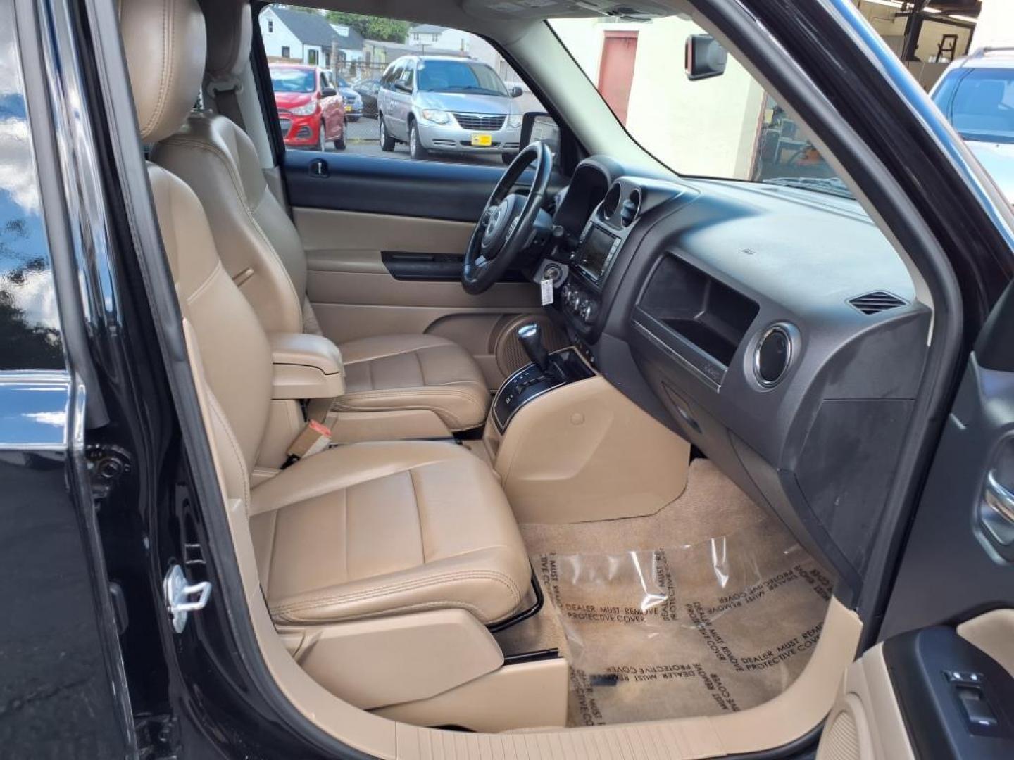 2016 Black Clear Coat Jeep Patriot High Altitude (1C4NJRFB3GD) with an 2.4L 4 Cylinder Sequential-Port F.I. engine, AWD transmission, located at 50 Eastern Blvd., Essex, MD, 21221, (410) 686-3444, 39.304367, -76.484947 - Photo#17
