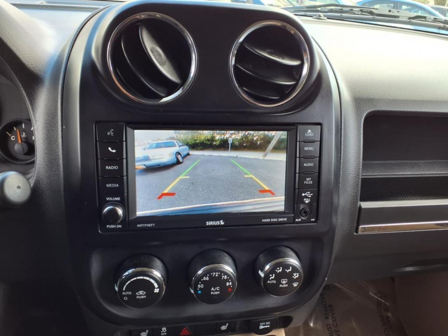 2016 Black Clear Coat Jeep Patriot High Altitude (1C4NJRFB3GD) with an 2.4L 4 Cylinder Sequential-Port F.I. engine, AWD transmission, located at 50 Eastern Blvd., Essex, MD, 21221, (410) 686-3444, 39.304367, -76.484947 - Photo#19