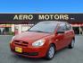2009 Tango Red Hyundai ACCENT GS (KMHCM36C29U) with an 1.6L 4 Cylinder Sequential-Port F.I. engine, 4CYL transmission, located at 50 Eastern Blvd., Essex, MD, 21221, (410) 686-3444, 39.304367, -76.484947 - Photo#0