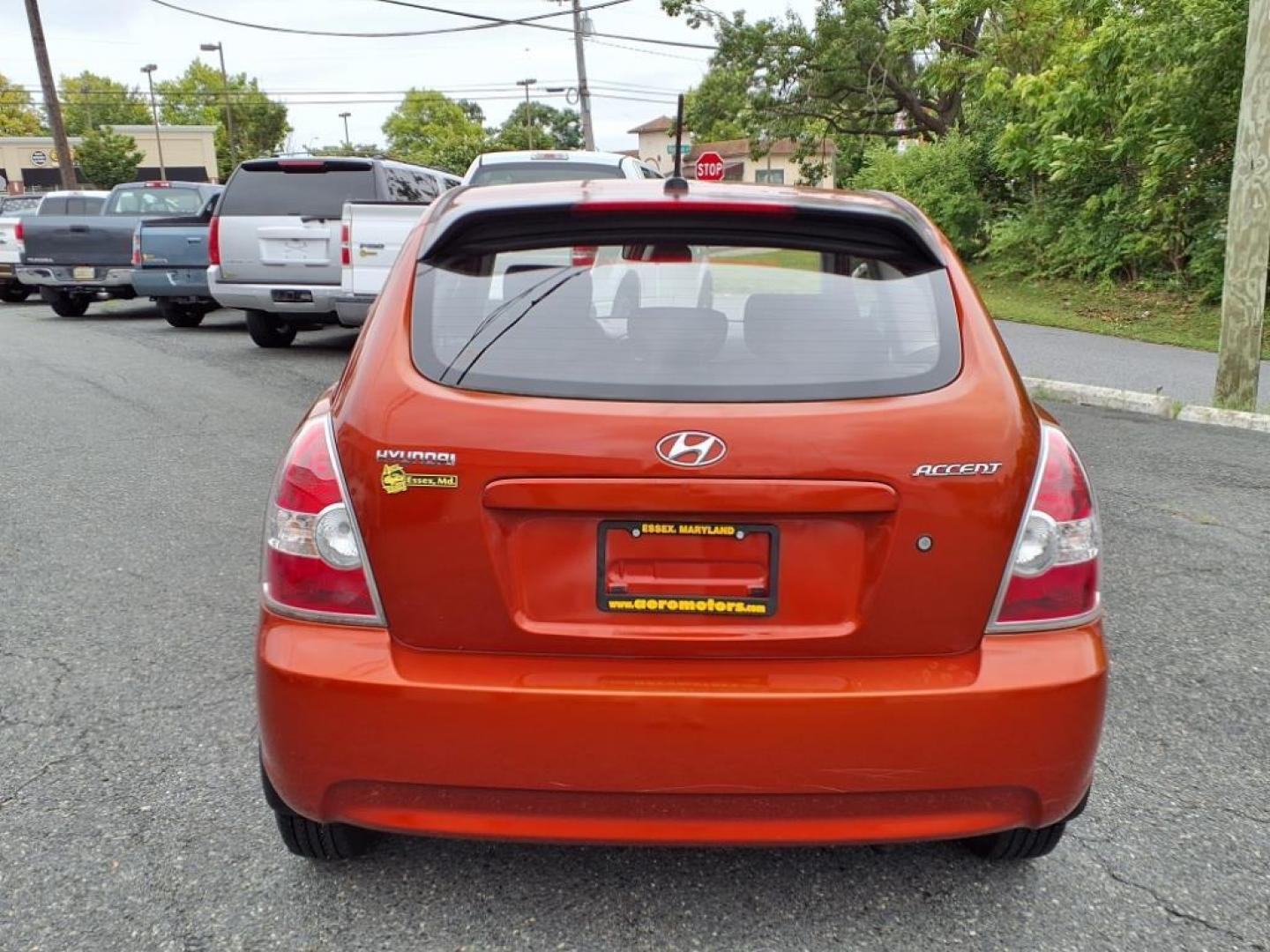 2009 Tango Red Hyundai ACCENT GS (KMHCM36C29U) with an 1.6L 4 Cylinder Sequential-Port F.I. engine, 4CYL transmission, located at 50 Eastern Blvd., Essex, MD, 21221, (410) 686-3444, 39.304367, -76.484947 - Photo#3