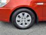 2009 Tango Red Hyundai ACCENT GS (KMHCM36C29U) with an 1.6L 4 Cylinder Sequential-Port F.I. engine, 4CYL transmission, located at 50 Eastern Blvd., Essex, MD, 21221, (410) 686-3444, 39.304367, -76.484947 - Photo#9