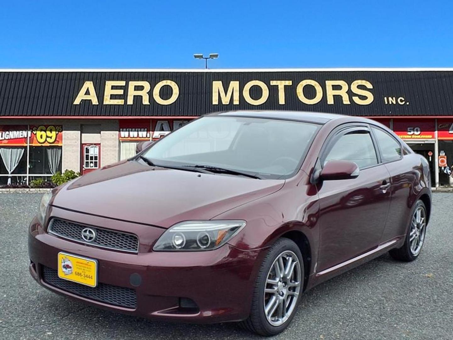 2007 Black Cherry Pearl Scion tC Base (JTKDE167870) with an 2.4L 2.4L I4 161hp 162ft. lbs. Fuel Injected engine, 4-Speed Automatic transmission, located at 50 Eastern Blvd., Essex, MD, 21221, (410) 686-3444, 39.304367, -76.484947 - Photo#0