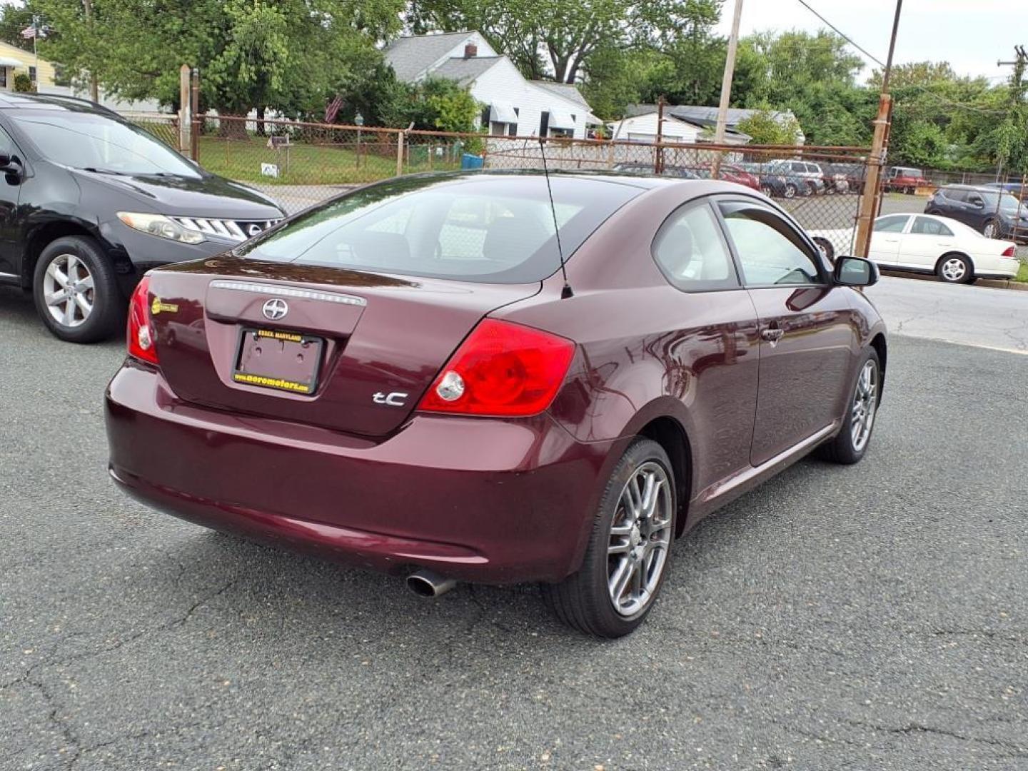 2007 Black Cherry Pearl Scion tC Base (JTKDE167870) with an 2.4L 2.4L I4 161hp 162ft. lbs. Fuel Injected engine, 4-Speed Automatic transmission, located at 50 Eastern Blvd., Essex, MD, 21221, (410) 686-3444, 39.304367, -76.484947 - Photo#4
