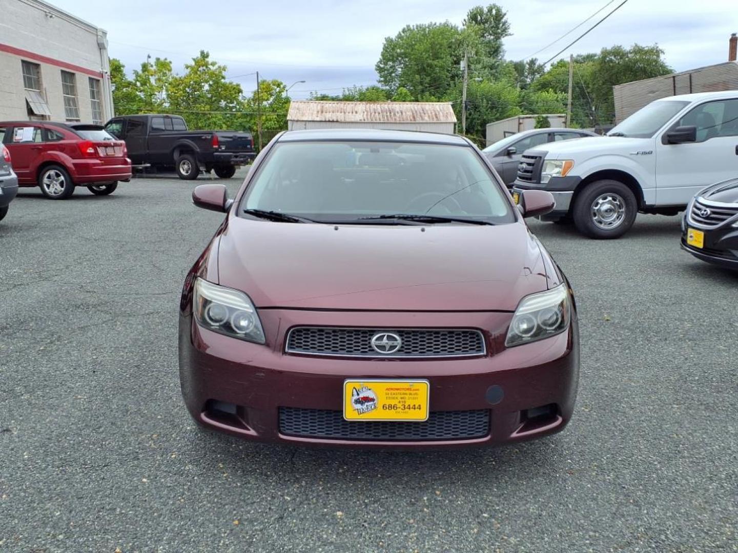 2007 Black Cherry Pearl Scion tC Base (JTKDE167870) with an 2.4L 2.4L I4 161hp 162ft. lbs. Fuel Injected engine, 4-Speed Automatic transmission, located at 50 Eastern Blvd., Essex, MD, 21221, (410) 686-3444, 39.304367, -76.484947 - Photo#7