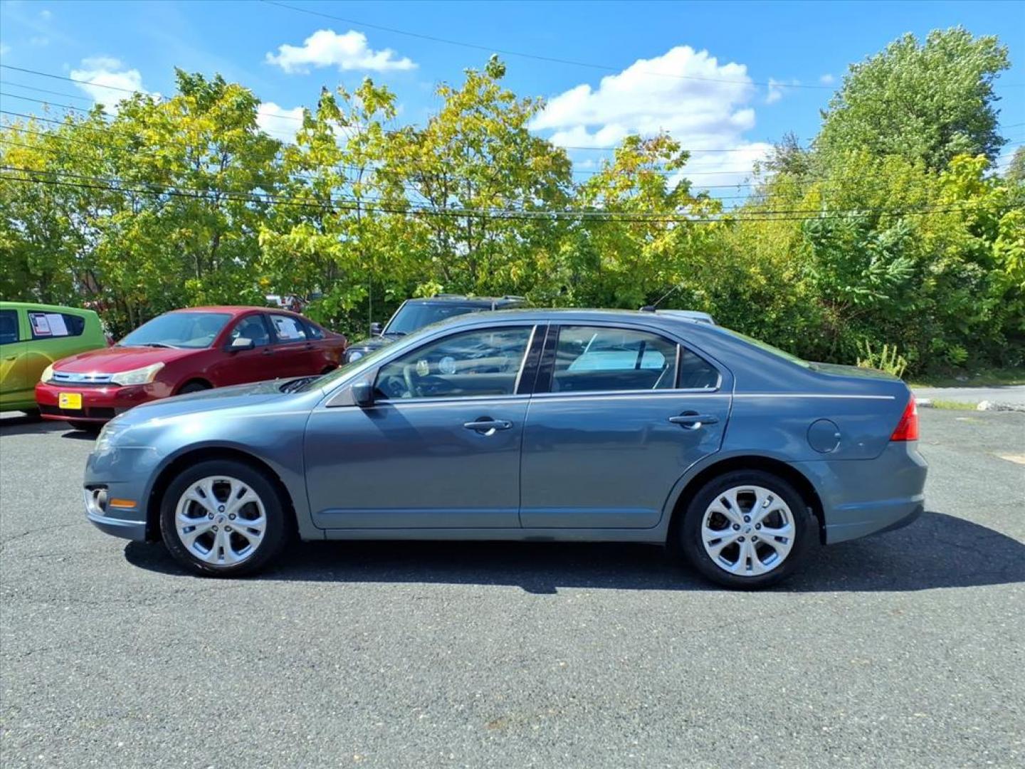 2012 Steel Blue Metallic Ford Fusion SE (3FAHP0HA9CR) with an 2.5L 4 Cylinder Sequential-Port F.I. engine, 4CYL transmission, located at 50 Eastern Blvd., Essex, MD, 21221, (410) 686-3444, 39.304367, -76.484947 - Photo#1