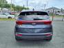 2019 Pacific Blue Kia Sportage LX (KNDPMCAC7K7) with an 2.4L 4 Cylinder Fuel Injected engine, 4CYL AWD transmission, located at 50 Eastern Blvd., Essex, MD, 21221, (410) 686-3444, 39.304367, -76.484947 - Photo#3