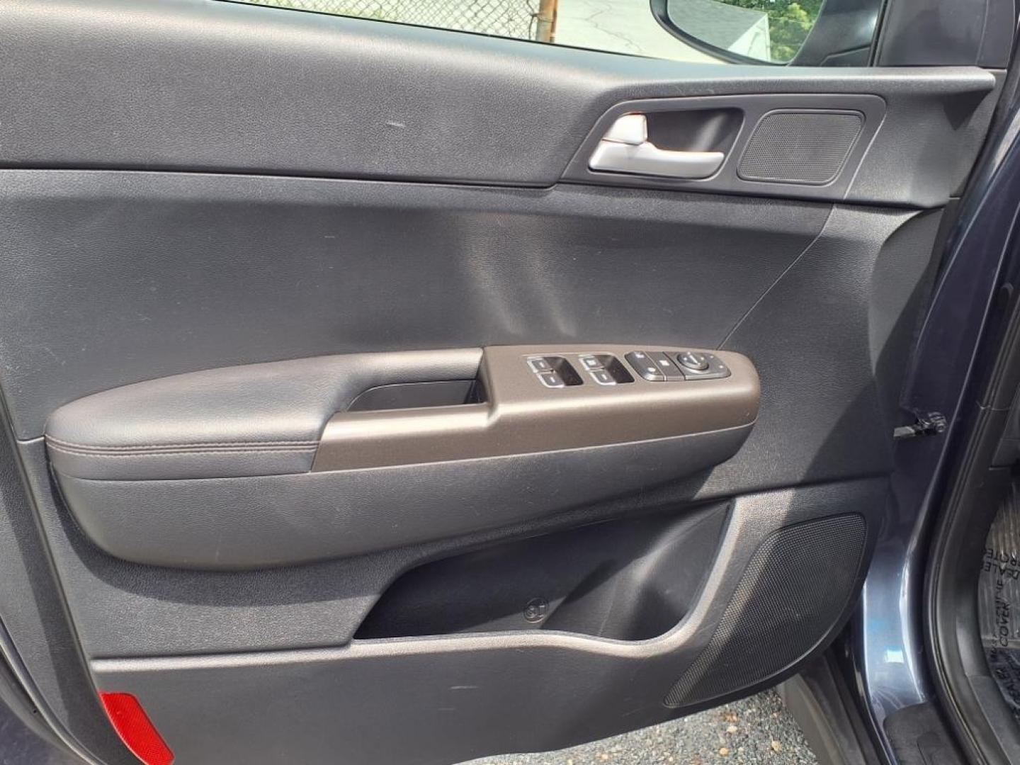 2019 Pacific Blue Kia Sportage LX (KNDPMCAC7K7) with an 2.4L 4 Cylinder Fuel Injected engine, 4CYL AWD transmission, located at 50 Eastern Blvd., Essex, MD, 21221, (410) 686-3444, 39.304367, -76.484947 - Photo#10