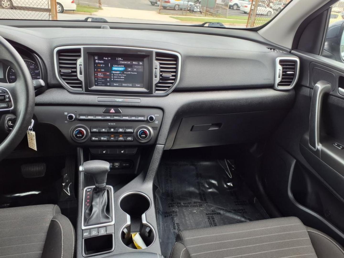2019 Pacific Blue Kia Sportage LX (KNDPMCAC7K7) with an 2.4L 4 Cylinder Fuel Injected engine, 4CYL AWD transmission, located at 50 Eastern Blvd., Essex, MD, 21221, (410) 686-3444, 39.304367, -76.484947 - Photo#16