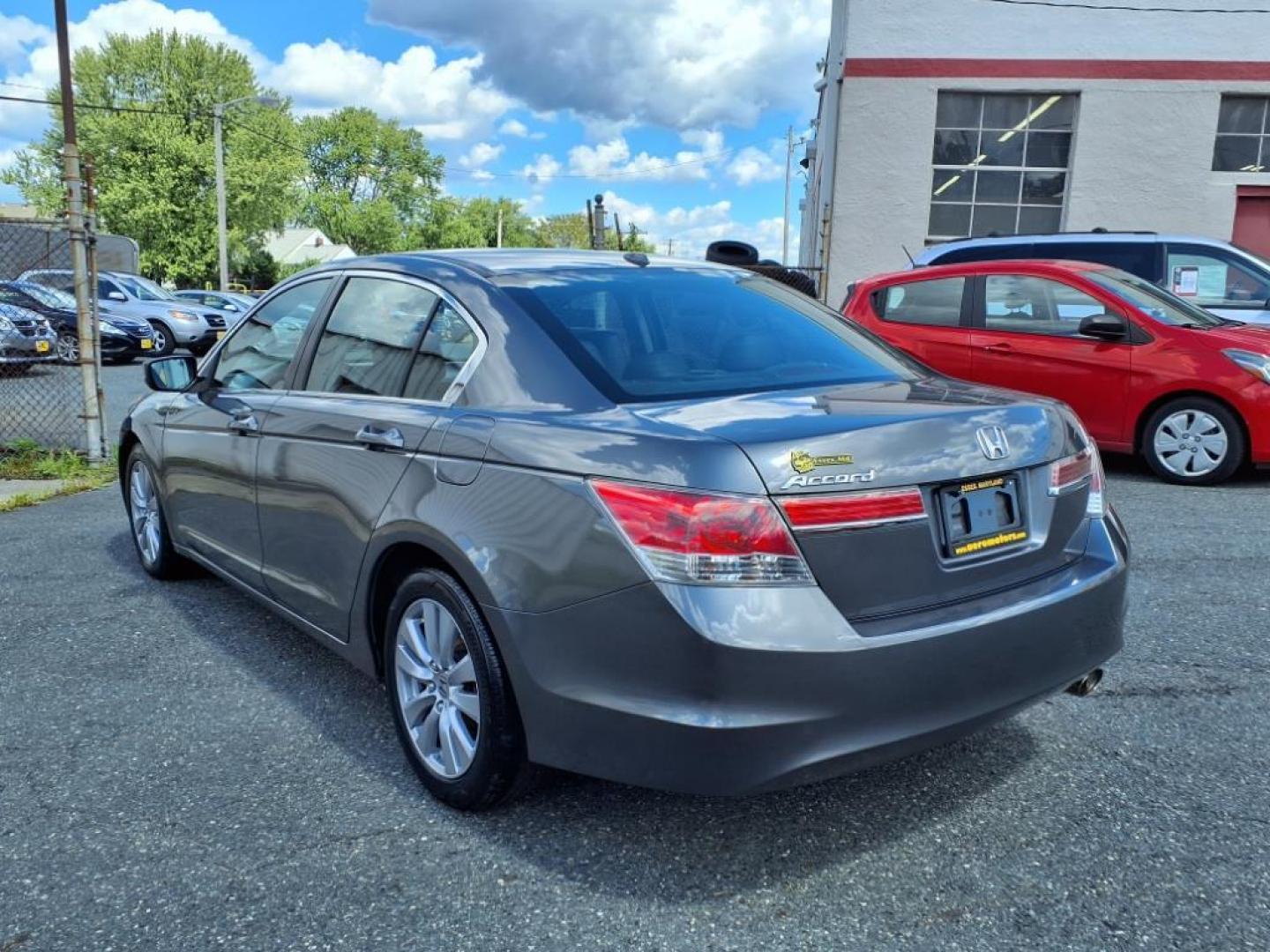 2012 Polished Metal Metallic Honda Accord EX-L (1HGCP2F89CA) with an 2.4L 2.4L I4 190hp 162ft. lbs. Sequential-Port F.I. engine, 5-Speed Automatic transmission, located at 50 Eastern Blvd., Essex, MD, 21221, (410) 686-3444, 39.304367, -76.484947 - Photo#2
