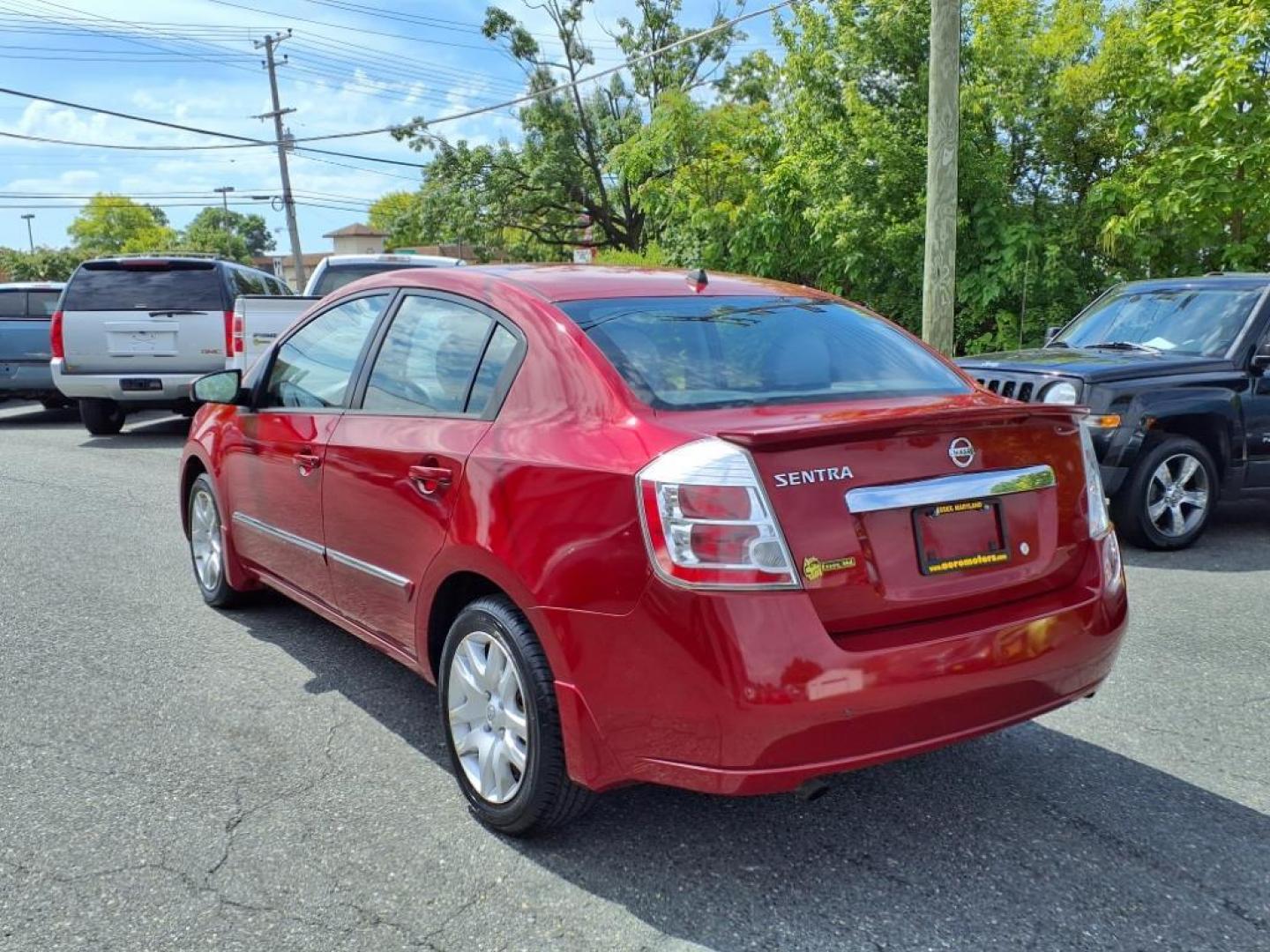 2012 Red Brick Nissan Sentra 2.0 S (3N1AB6AP7CL) with an 2.0L 2.0L I4 140hp 147ft. lbs. Sequential-Port F.I. engine, CVT transmission, located at 50 Eastern Blvd., Essex, MD, 21221, (410) 686-3444, 39.304367, -76.484947 - Photo#2