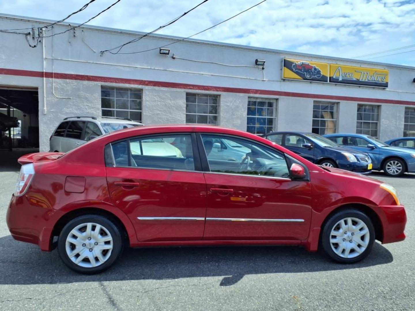 2012 Red Brick Nissan Sentra 2.0 S (3N1AB6AP7CL) with an 2.0L 2.0L I4 140hp 147ft. lbs. Sequential-Port F.I. engine, CVT transmission, located at 50 Eastern Blvd., Essex, MD, 21221, (410) 686-3444, 39.304367, -76.484947 - Photo#4