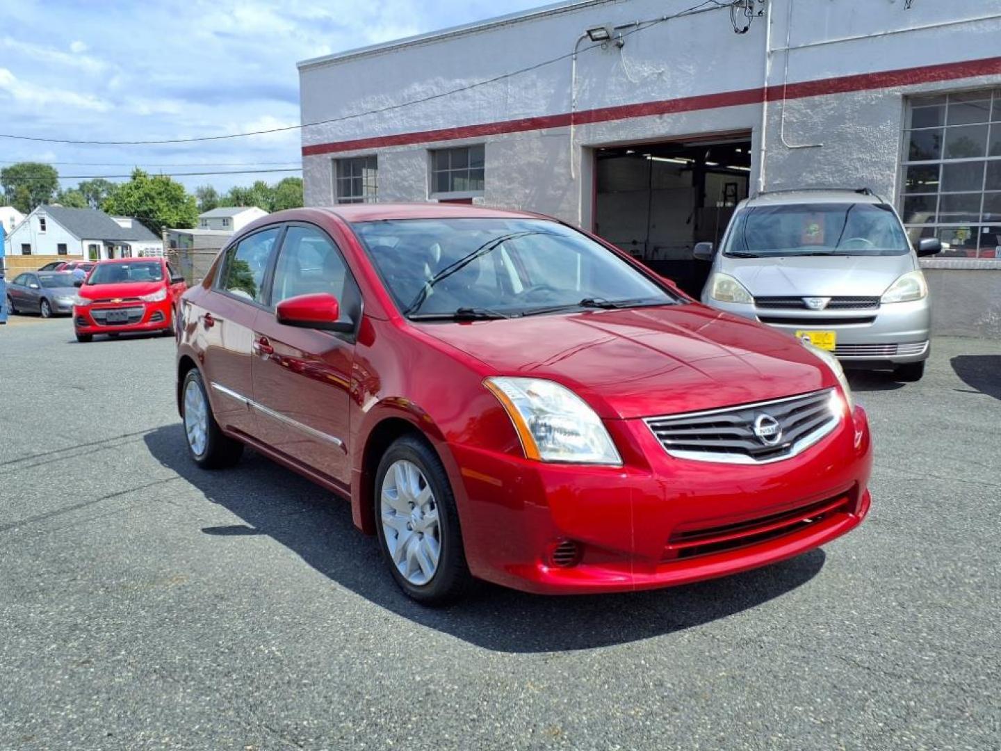 2012 Red Brick Nissan Sentra 2.0 S (3N1AB6AP7CL) with an 2.0L 2.0L I4 140hp 147ft. lbs. Sequential-Port F.I. engine, CVT transmission, located at 50 Eastern Blvd., Essex, MD, 21221, (410) 686-3444, 39.304367, -76.484947 - Photo#5