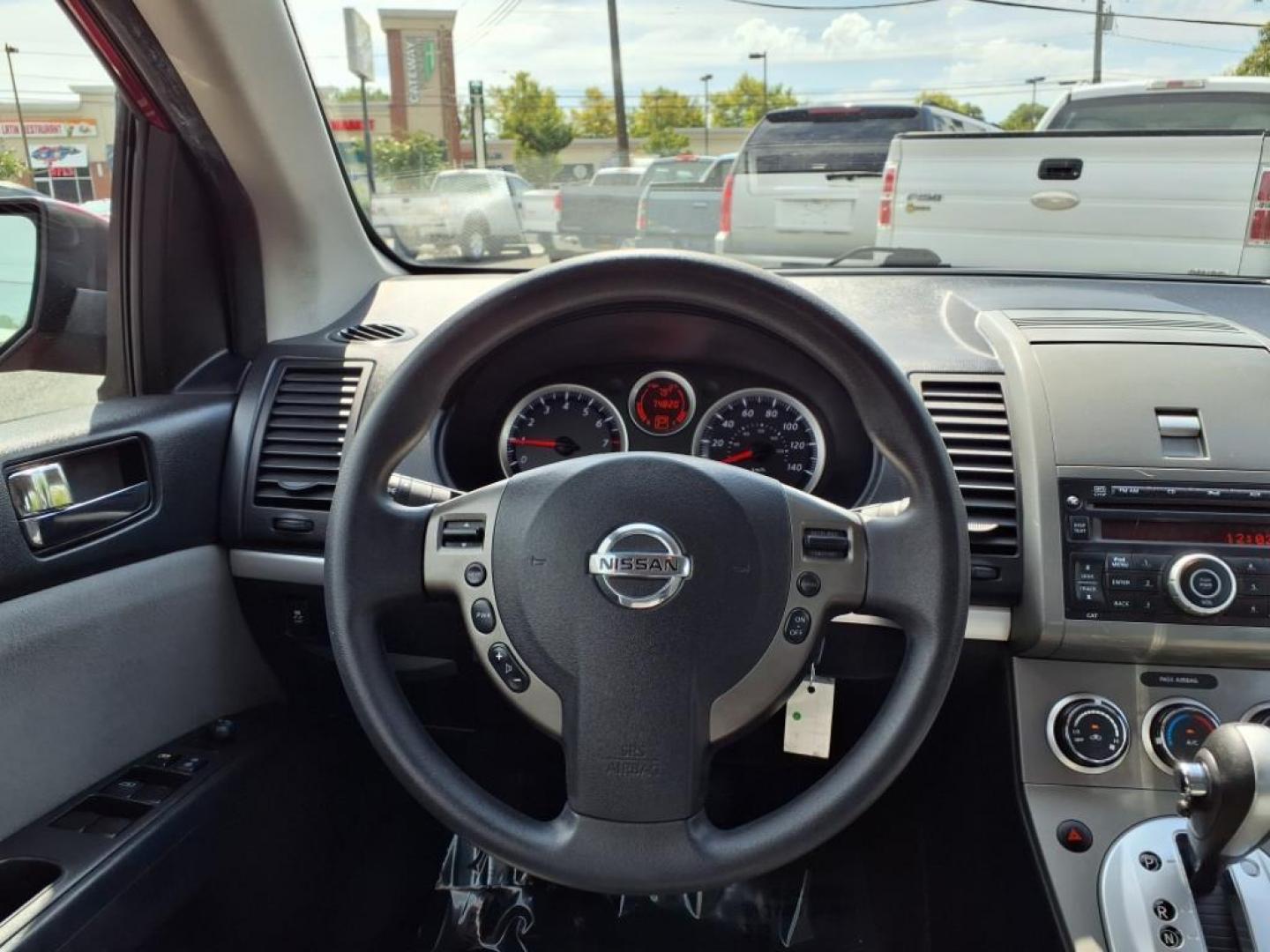2012 Red Brick Nissan Sentra 2.0 S (3N1AB6AP7CL) with an 2.0L 2.0L I4 140hp 147ft. lbs. Sequential-Port F.I. engine, CVT transmission, located at 50 Eastern Blvd., Essex, MD, 21221, (410) 686-3444, 39.304367, -76.484947 - Photo#12