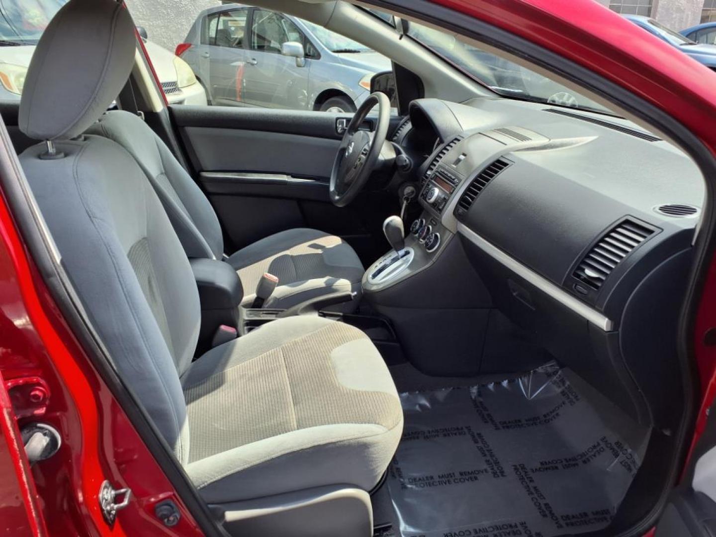 2012 Red Brick Nissan Sentra 2.0 S (3N1AB6AP7CL) with an 2.0L 2.0L I4 140hp 147ft. lbs. Sequential-Port F.I. engine, CVT transmission, located at 50 Eastern Blvd., Essex, MD, 21221, (410) 686-3444, 39.304367, -76.484947 - Photo#15