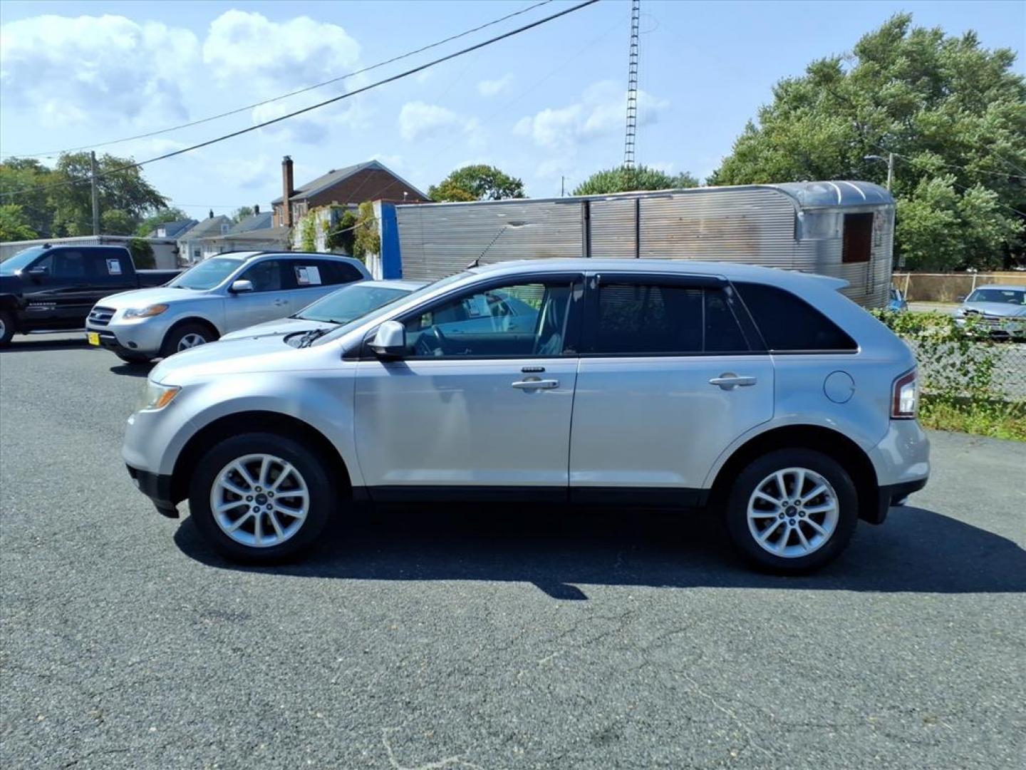 2009 Brilliant Silver Clearcoat Metallic Ford Edge SEL (2FMDK48C89B) with an 3.5L 6 Cylinder Sequential-Port F.I. engine, 4CYL transmission, located at 50 Eastern Blvd., Essex, MD, 21221, (410) 686-3444, 39.304367, -76.484947 - Photo#1