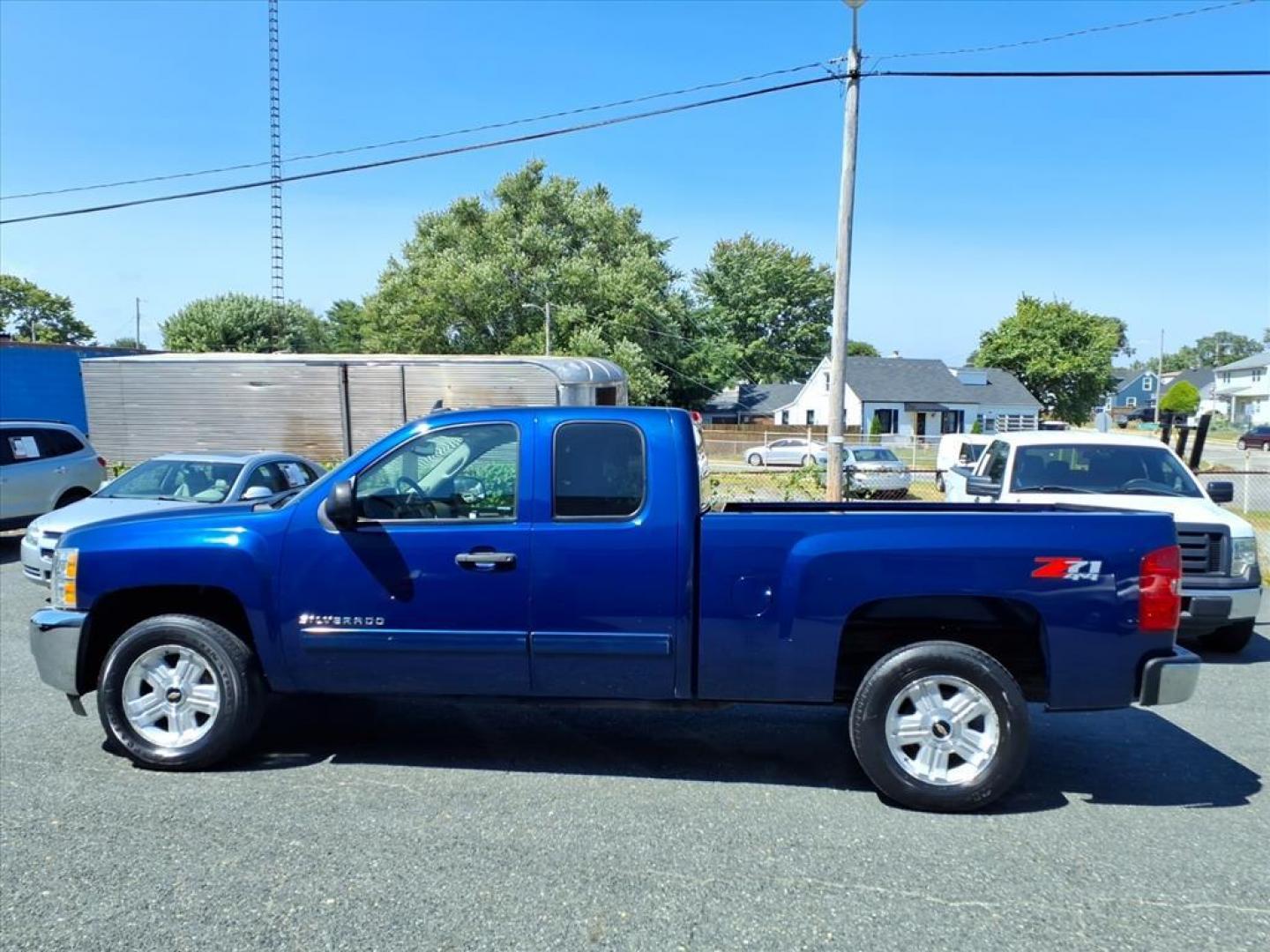 2013 Blue Chevrolet Silverado 1500 LT (1GCRKSE74DZ) with an 5.3L 8 Cylinder Sequential-Port F.I. engine, AT 4X4 transmission, located at 50 Eastern Blvd., Essex, MD, 21221, (410) 686-3444, 39.304367, -76.484947 - Photo#1