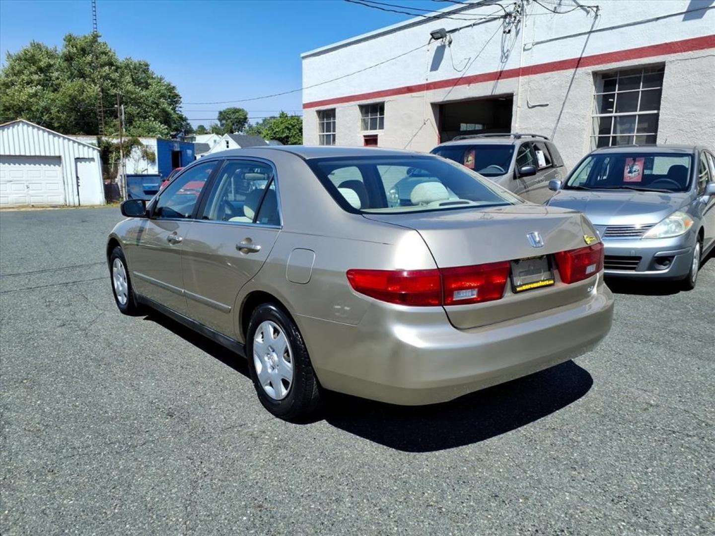 2005 Desert Mist Metallic Honda Accord LX (1HGCM56455A) with an 2.4L 4 Cylinder Fuel Injected engine, Automatic transmission, located at 50 Eastern Blvd., Essex, MD, 21221, (410) 686-3444, 39.304367, -76.484947 - Photo#2