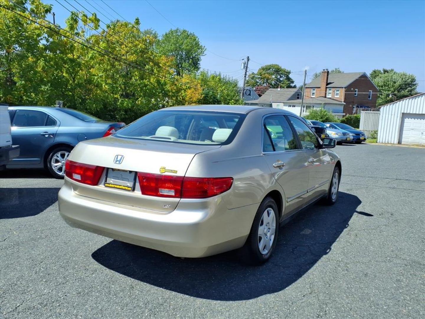 2005 Desert Mist Metallic Honda Accord LX (1HGCM56455A) with an 2.4L 4 Cylinder Fuel Injected engine, Automatic transmission, located at 50 Eastern Blvd., Essex, MD, 21221, (410) 686-3444, 39.304367, -76.484947 - Photo#4