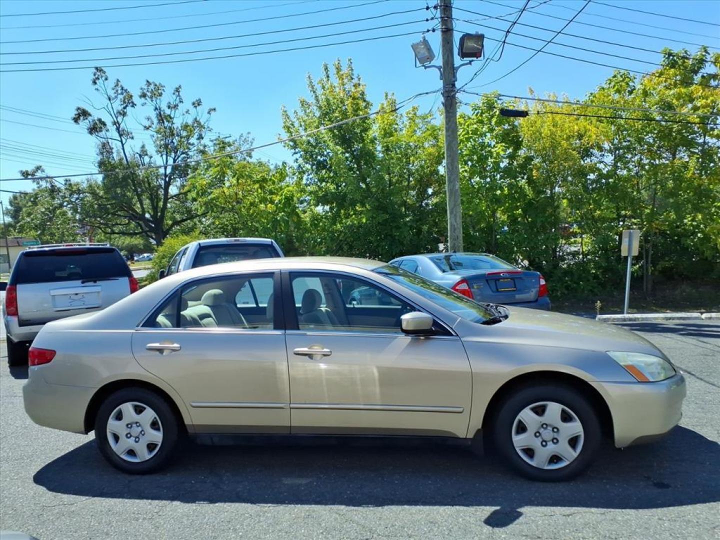 2005 Desert Mist Metallic Honda Accord LX (1HGCM56455A) with an 2.4L 4 Cylinder Fuel Injected engine, Automatic transmission, located at 50 Eastern Blvd., Essex, MD, 21221, (410) 686-3444, 39.304367, -76.484947 - Photo#5