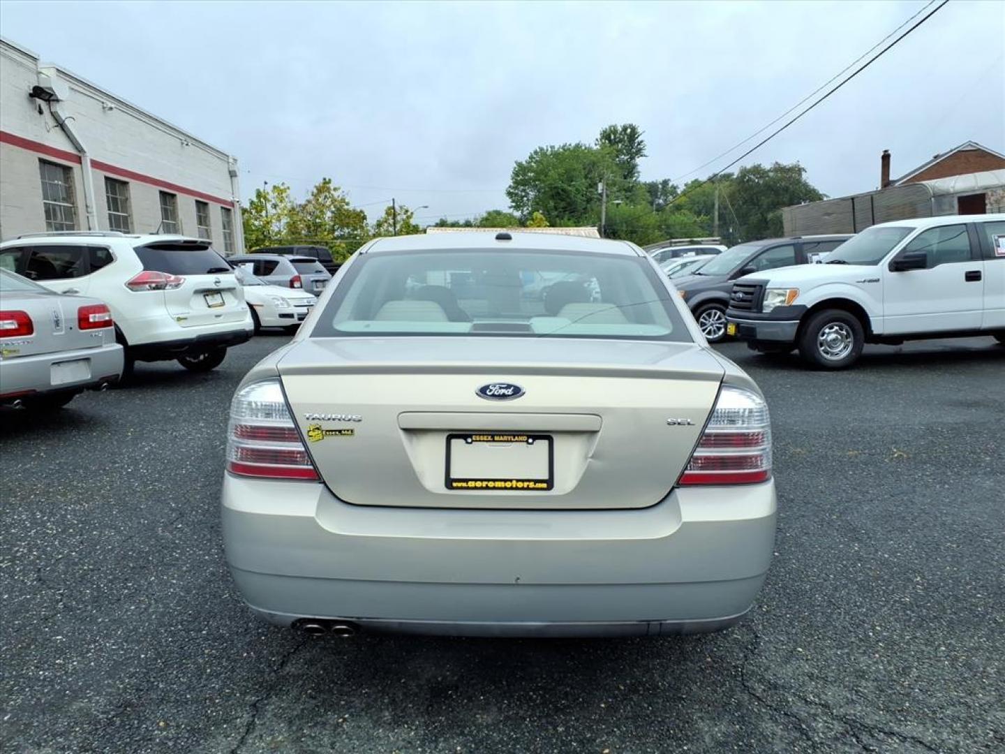 2009 Smokestone Clearcoat Metallic Ford Taurus SEL (1FAHP24W29G) with an 3.5L 6 Cylinder Sequential-Port F.I. engine, V6 transmission, located at 50 Eastern Blvd., Essex, MD, 21221, (410) 686-3444, 39.304367, -76.484947 - Photo#3