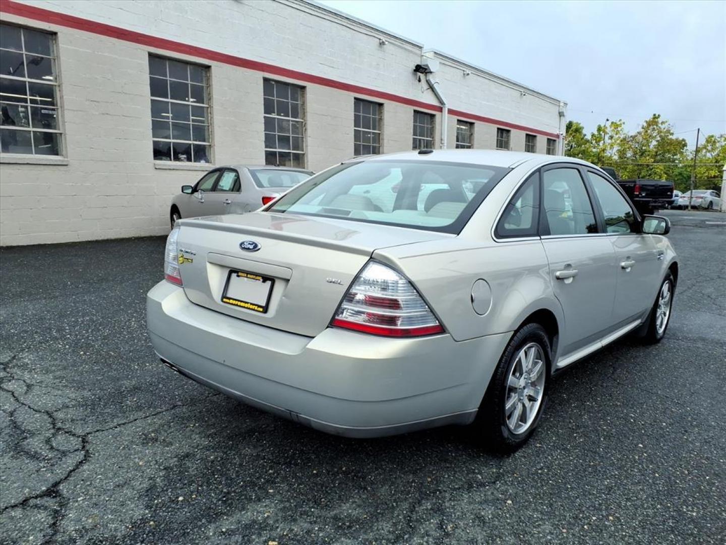 2009 Smokestone Clearcoat Metallic Ford Taurus SEL (1FAHP24W29G) with an 3.5L 6 Cylinder Sequential-Port F.I. engine, V6 transmission, located at 50 Eastern Blvd., Essex, MD, 21221, (410) 686-3444, 39.304367, -76.484947 - Photo#4