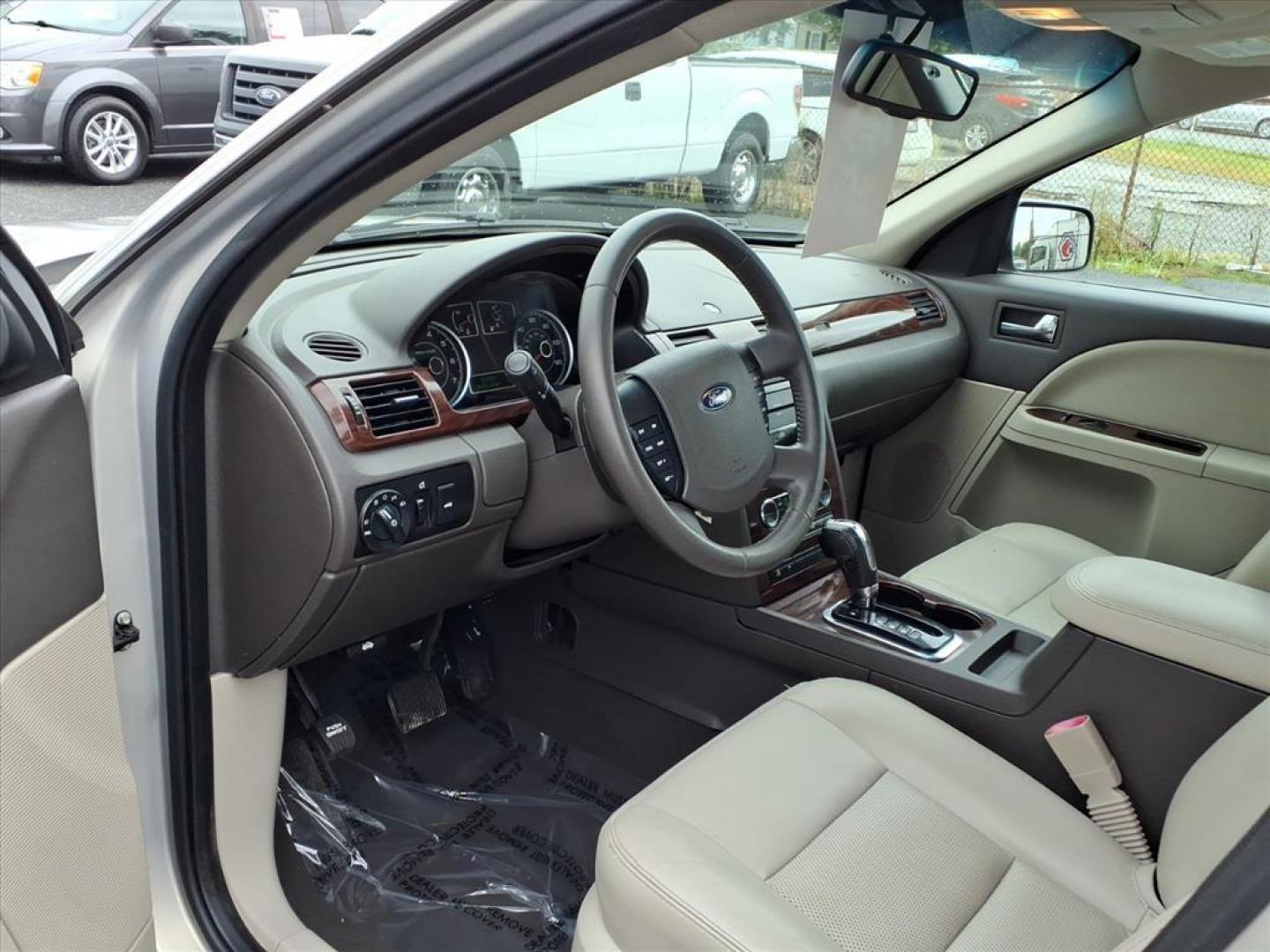 2009 Smokestone Clearcoat Metallic Ford Taurus SEL (1FAHP24W29G) with an 3.5L 6 Cylinder Sequential-Port F.I. engine, V6 transmission, located at 50 Eastern Blvd., Essex, MD, 21221, (410) 686-3444, 39.304367, -76.484947 - Photo#9