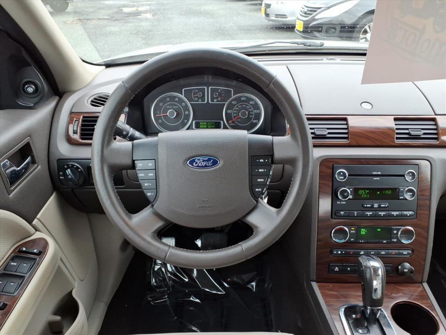 2009 Smokestone Clearcoat Metallic Ford Taurus SEL (1FAHP24W29G) with an 3.5L 6 Cylinder Sequential-Port F.I. engine, V6 transmission, located at 50 Eastern Blvd., Essex, MD, 21221, (410) 686-3444, 39.304367, -76.484947 - Photo#12