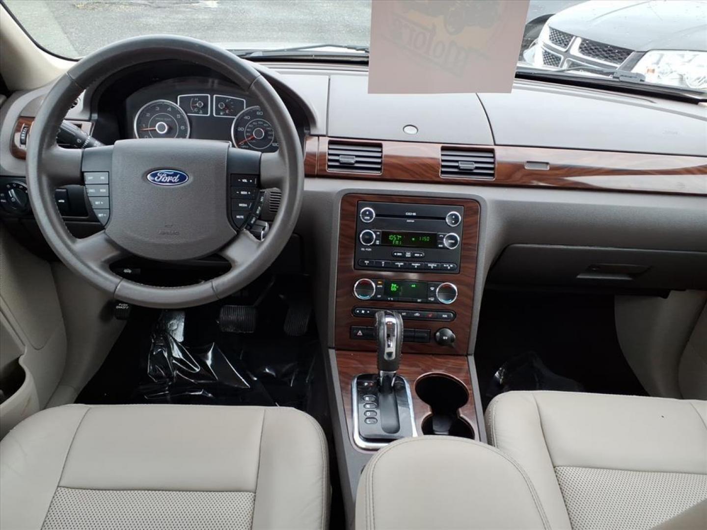 2009 Smokestone Clearcoat Metallic Ford Taurus SEL (1FAHP24W29G) with an 3.5L 6 Cylinder Sequential-Port F.I. engine, V6 transmission, located at 50 Eastern Blvd., Essex, MD, 21221, (410) 686-3444, 39.304367, -76.484947 - Photo#13