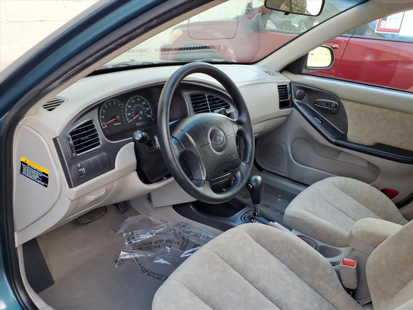 2003 Blue Hyundai ELANTRA GL (KMHDN45D83U) with an 2.0L 4 Cylinder Fuel Injected engine, Automatic transmission, located at 50 Eastern Blvd., Essex, MD, 21221, (410) 686-3444, 39.304367, -76.484947 - Photo#10