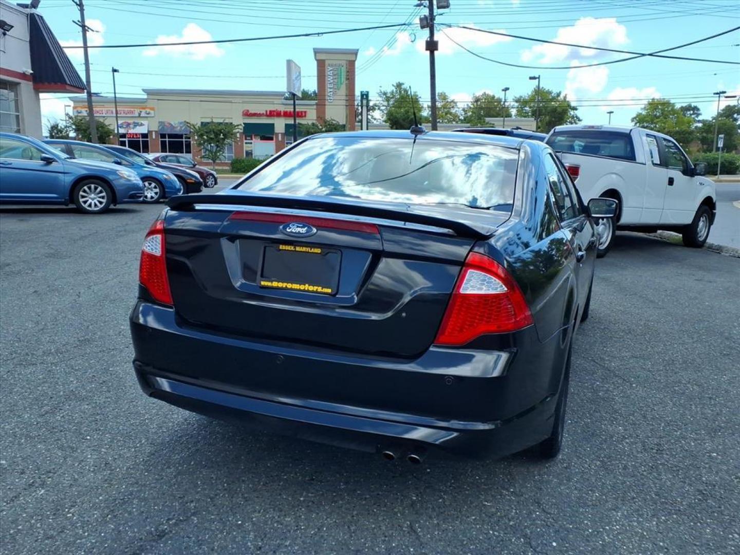 2011 Black Ford Fusion SE (3FAHP0HA4BR) with an 2.5L 4 Cylinder Sequential-Port F.I. engine, Automatic transmission, located at 50 Eastern Blvd., Essex, MD, 21221, (410) 686-3444, 39.304367, -76.484947 - Photo#3