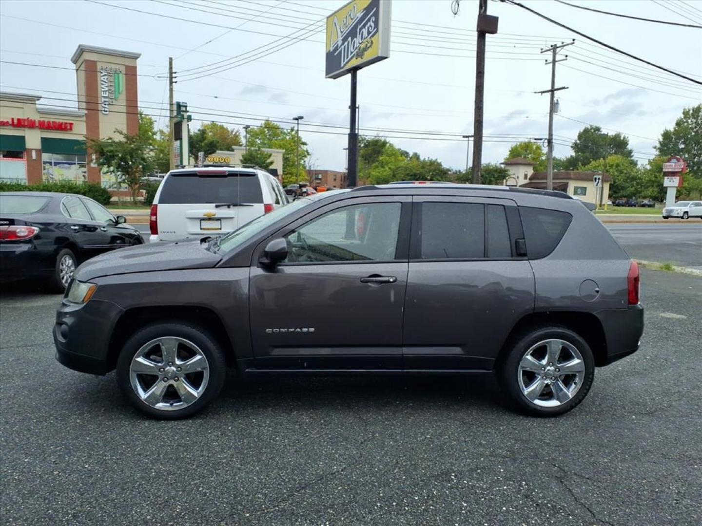 2015 Granite Crystal Metallic Clear Coat Jeep Compass Latitude (1C4NJDEBXFD) with an 2.4L 4 Cylinder Sequential-Port F.I. engine, Automatic transmission, located at 50 Eastern Blvd., Essex, MD, 21221, (410) 686-3444, 39.304367, -76.484947 - Photo#1