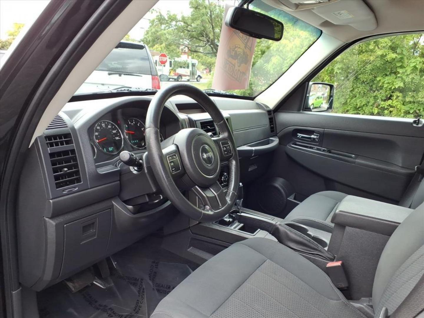 2012 Black Jeep Liberty Sport (1C4PJMAK9CW) with an 3.7L 3.7L V6 210hp 235ft. lbs. Sequential-Port F.I. engine, 4-Speed Automatic transmission, located at 50 Eastern Blvd., Essex, MD, 21221, (410) 686-3444, 39.304367, -76.484947 - Photo#9