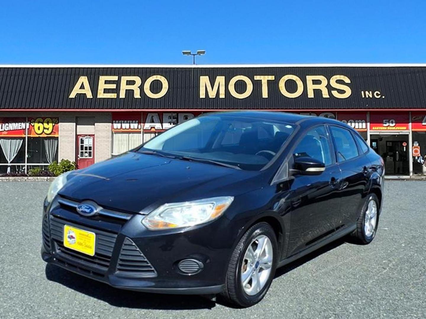 2013 Tuxedo Black Metallic Ford Focus SE (1FADP3F20DL) with an 2.0L 4 Cylinder Fuel Injected engine, 4CYL AT transmission, located at 50 Eastern Blvd., Essex, MD, 21221, (410) 686-3444, 39.304367, -76.484947 - Photo#0