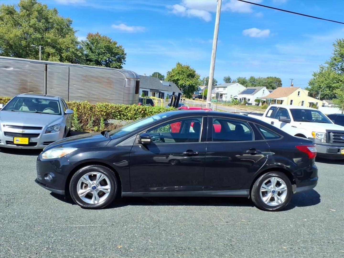 2013 Tuxedo Black Metallic Ford Focus SE (1FADP3F20DL) with an 2.0L 4 Cylinder Fuel Injected engine, 4CYL AT transmission, located at 50 Eastern Blvd., Essex, MD, 21221, (410) 686-3444, 39.304367, -76.484947 - Photo#1