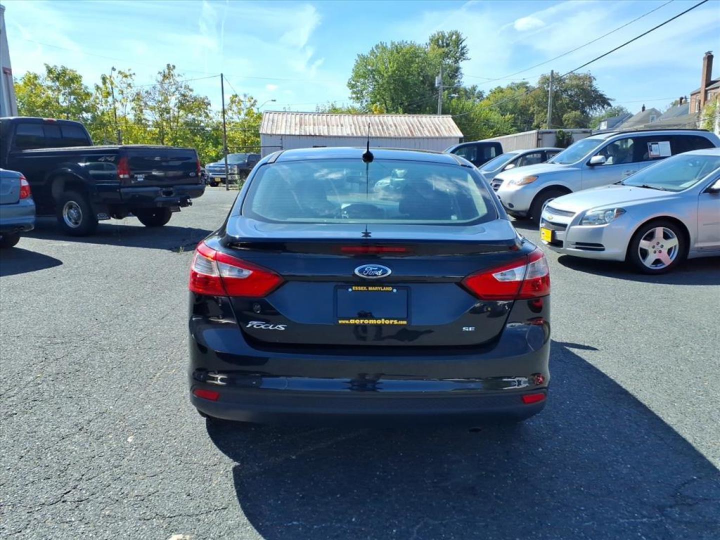 2013 Tuxedo Black Metallic Ford Focus SE (1FADP3F20DL) with an 2.0L 4 Cylinder Fuel Injected engine, 4CYL AT transmission, located at 50 Eastern Blvd., Essex, MD, 21221, (410) 686-3444, 39.304367, -76.484947 - Photo#3
