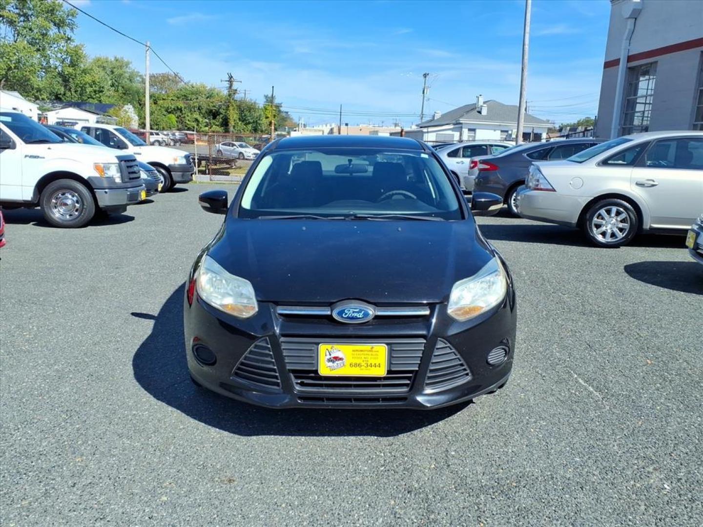 2013 Tuxedo Black Metallic Ford Focus SE (1FADP3F20DL) with an 2.0L 4 Cylinder Fuel Injected engine, 4CYL AT transmission, located at 50 Eastern Blvd., Essex, MD, 21221, (410) 686-3444, 39.304367, -76.484947 - Photo#6