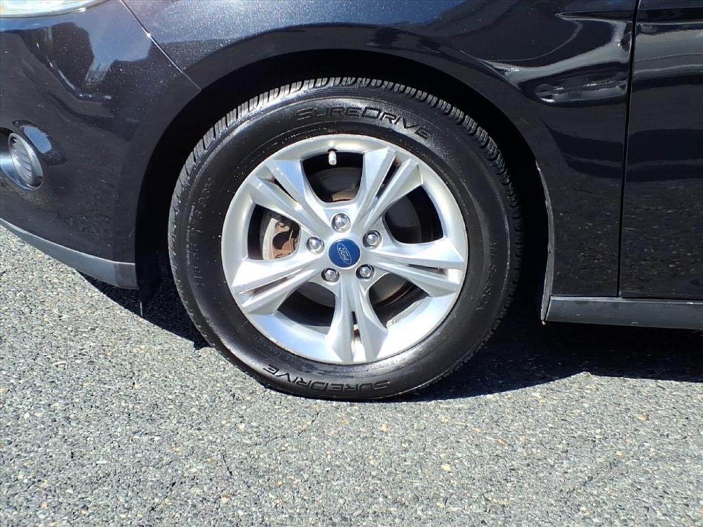 2013 Tuxedo Black Metallic Ford Focus SE (1FADP3F20DL) with an 2.0L 4 Cylinder Fuel Injected engine, 4CYL AT transmission, located at 50 Eastern Blvd., Essex, MD, 21221, (410) 686-3444, 39.304367, -76.484947 - Photo#7