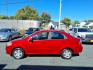 2009 Sport Red Chevrolet Aveo LS (KL1TD56E89B) with an 1.6L ECOTEC 1.6L I4 106hp 105ft. lbs. Sequential-Port F.I. engine, 5-Speed Manual transmission, located at 50 Eastern Blvd., Essex, MD, 21221, (410) 686-3444, 39.304367, -76.484947 - Photo#1
