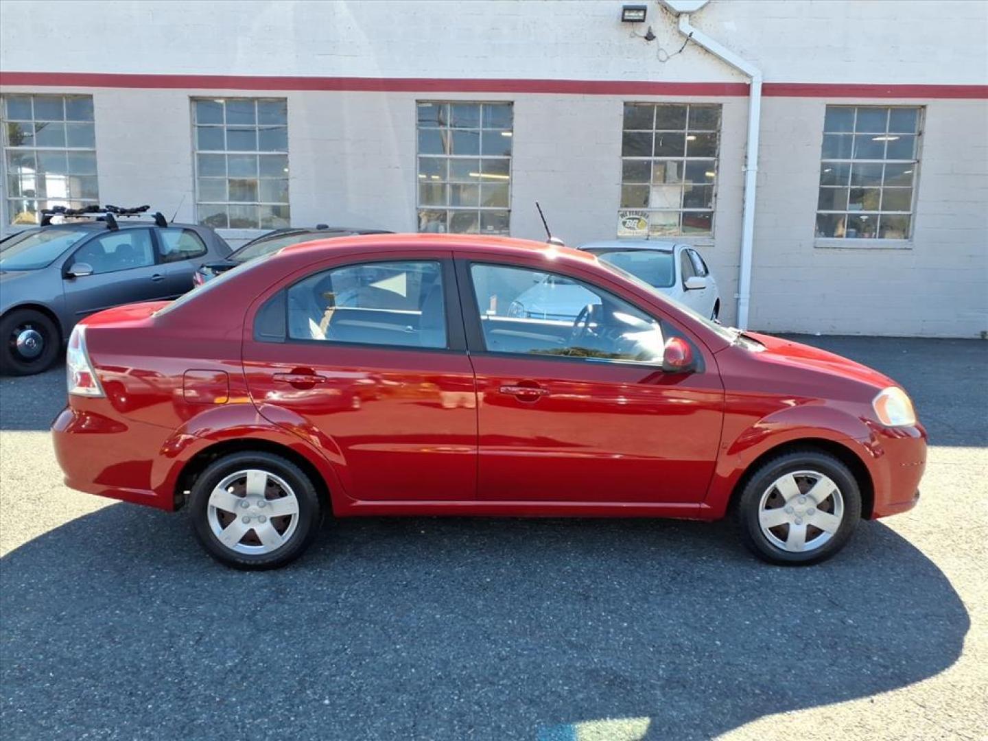 2009 Sport Red Chevrolet Aveo LS (KL1TD56E89B) with an 1.6L ECOTEC 1.6L I4 106hp 105ft. lbs. Sequential-Port F.I. engine, 5-Speed Manual transmission, located at 50 Eastern Blvd., Essex, MD, 21221, (410) 686-3444, 39.304367, -76.484947 - Photo#3