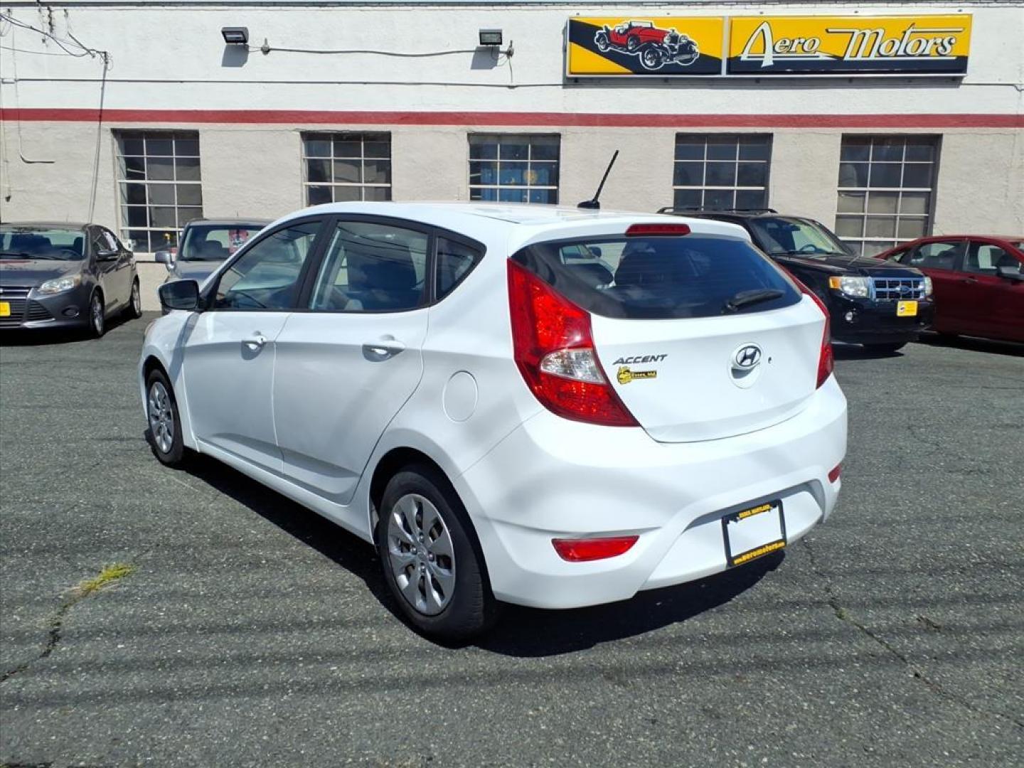 2017 Chalk White Hyundai ACCENT SE (KMHCT5AE6HU) with an 1.6L 4 Cylinder Fuel Injected engine, 4CYL transmission, located at 50 Eastern Blvd., Essex, MD, 21221, (410) 686-3444, 39.304367, -76.484947 - Photo#2
