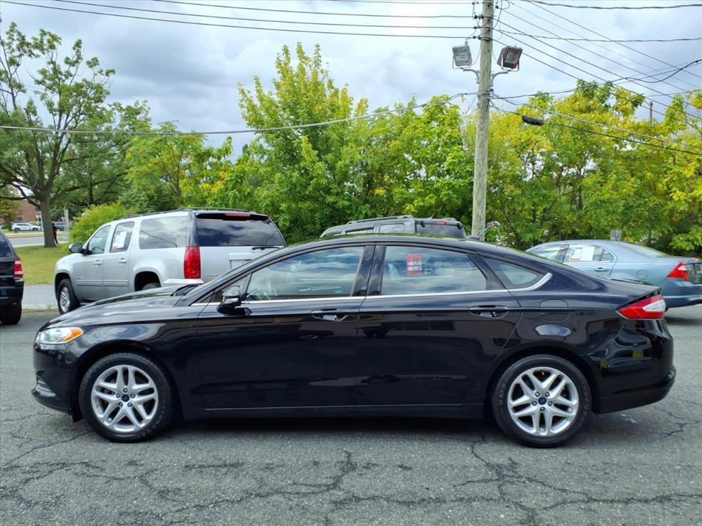 2016 Black Ford Fusion SE (3FA6P0H70GR) with an 2.5L 4 Cylinder Sequential-Port F.I. engine, 4CYL transmission, located at 50 Eastern Blvd., Essex, MD, 21221, (410) 686-3444, 39.304367, -76.484947 - Photo#1