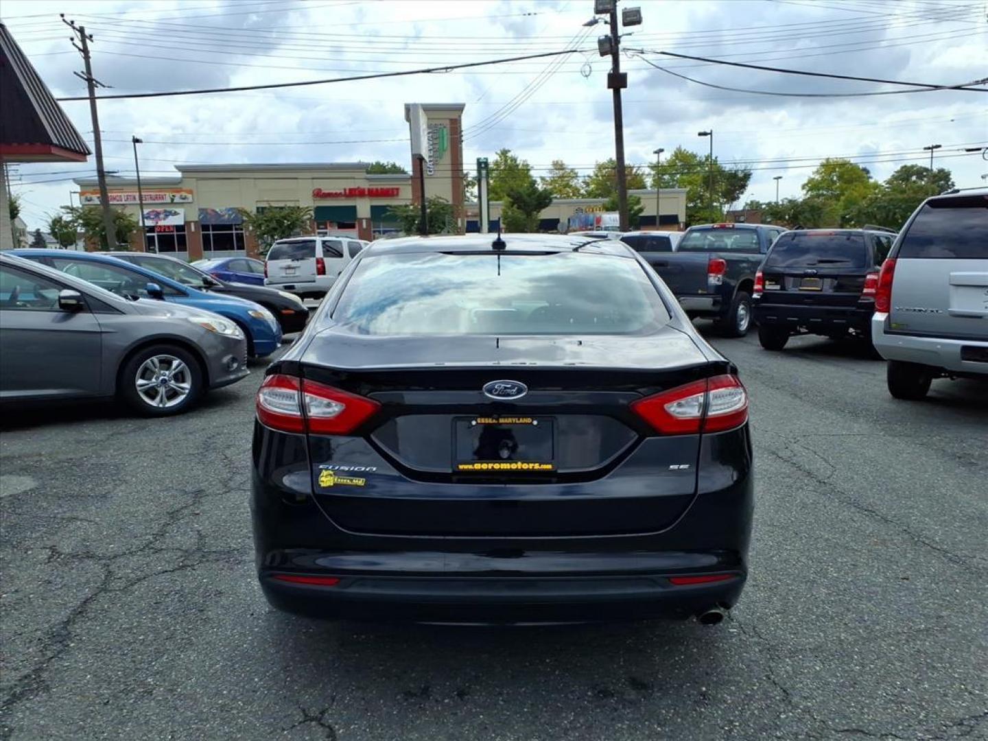 2016 Black Ford Fusion SE (3FA6P0H70GR) with an 2.5L 4 Cylinder Sequential-Port F.I. engine, 4CYL transmission, located at 50 Eastern Blvd., Essex, MD, 21221, (410) 686-3444, 39.304367, -76.484947 - Photo#3