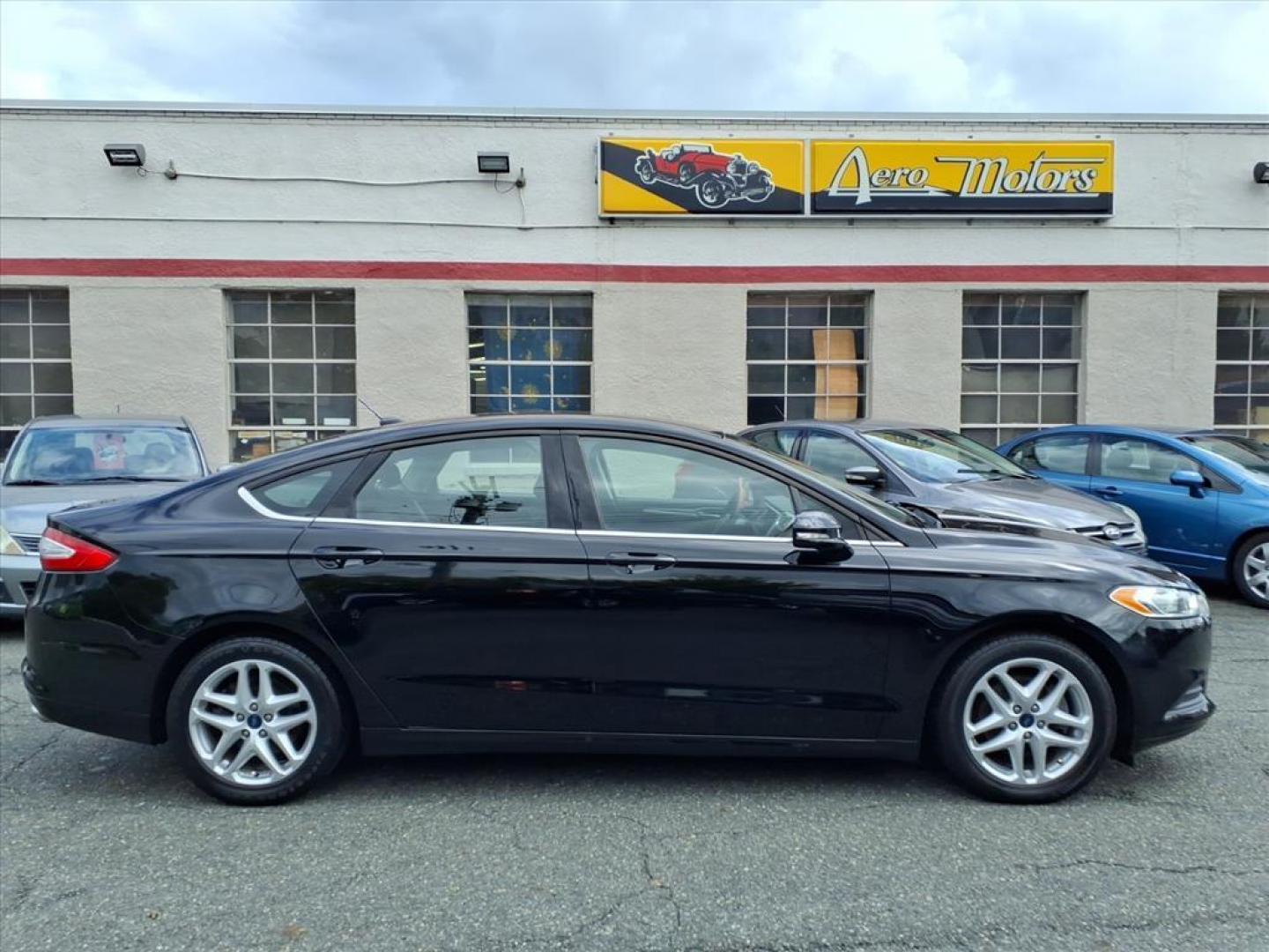 2016 Black Ford Fusion SE (3FA6P0H70GR) with an 2.5L 4 Cylinder Sequential-Port F.I. engine, 4CYL transmission, located at 50 Eastern Blvd., Essex, MD, 21221, (410) 686-3444, 39.304367, -76.484947 - Photo#5