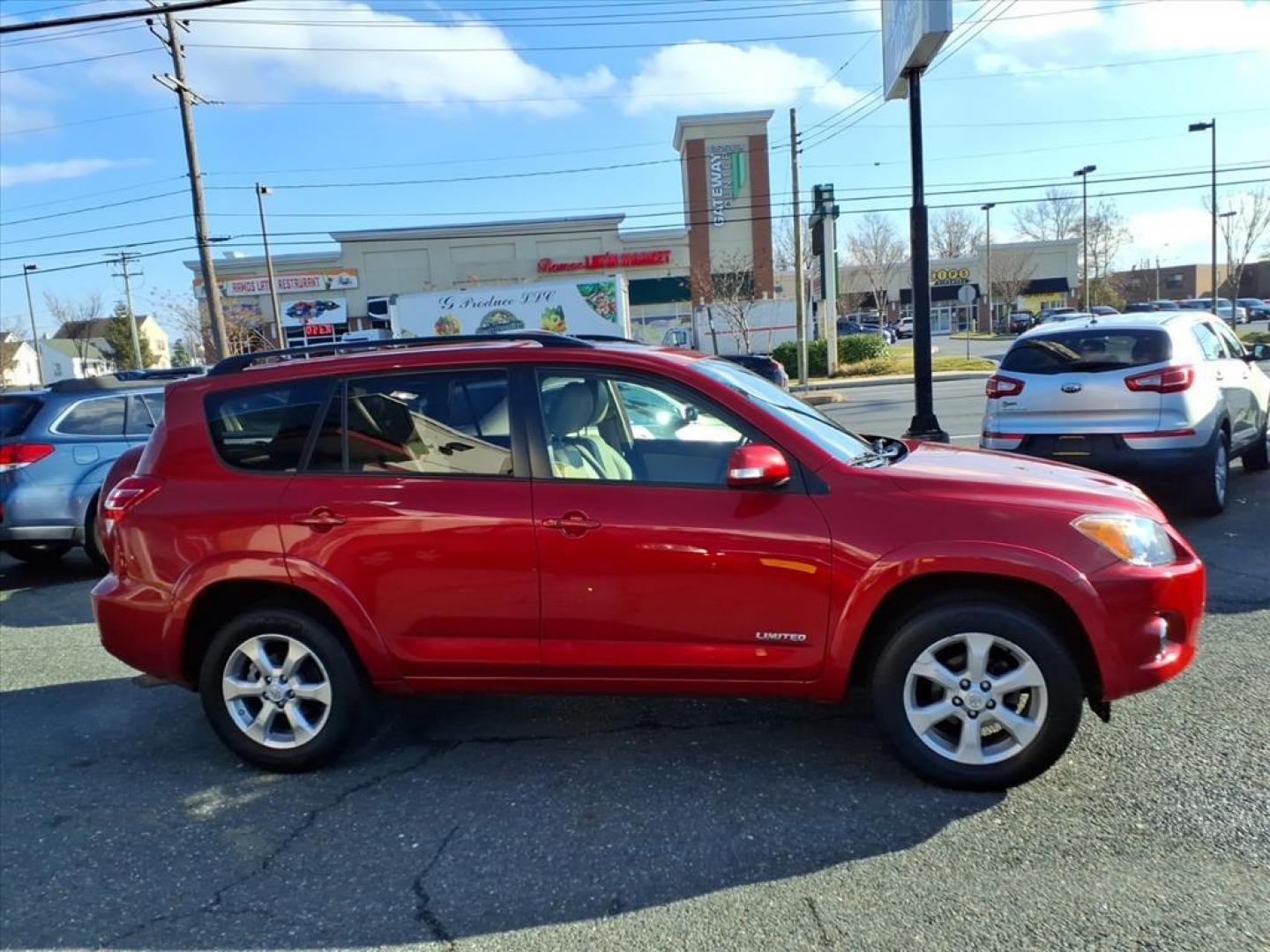 2012 Barcelona Red Metallic Toyota RAV4 Limited (2T3DF4DV6CW) with an 2.5L 4 Cylinder Sequential Fuel Injection engine, AT 4WD transmission, located at 50 Eastern Blvd., Essex, MD, 21221, (410) 686-3444, 39.304367, -76.484947 - Photo#5