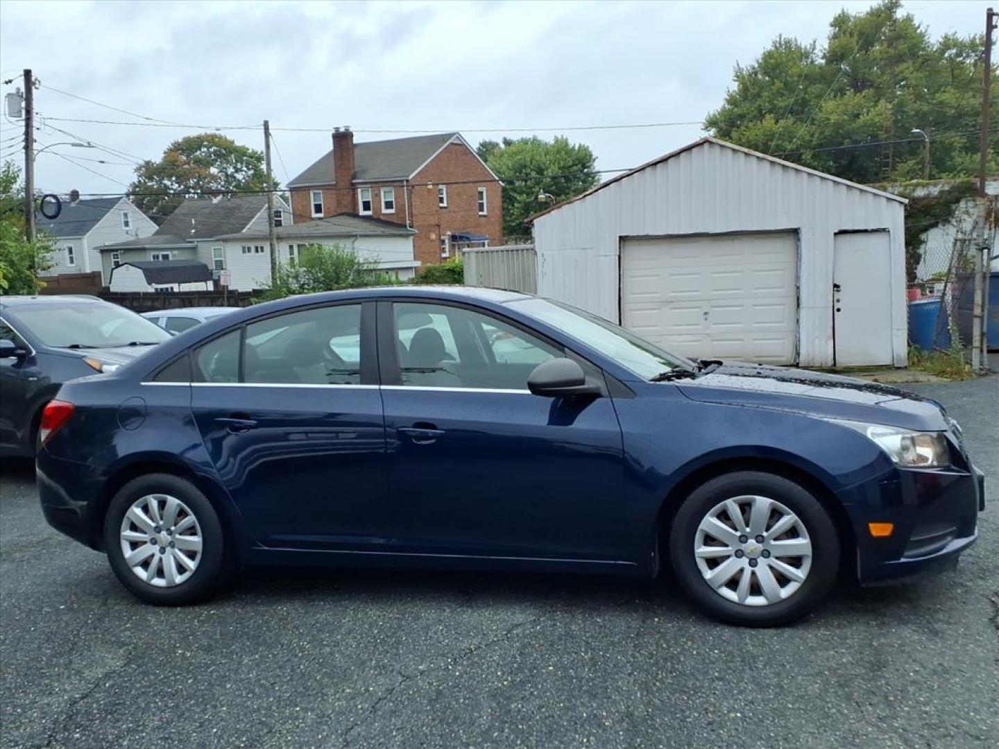 2011 Imperial Blue Metallic Chevrolet Cruze LS (1G1PC5SH3B7) with an 1.8L Ecotec 1.8L I4 136hp 123ft. lbs. Sequential-Port F.I. engine, 6-Speed Shiftable Automatic transmission, located at 50 Eastern Blvd., Essex, MD, 21221, (410) 686-3444, 39.304367, -76.484947 - Photo#5