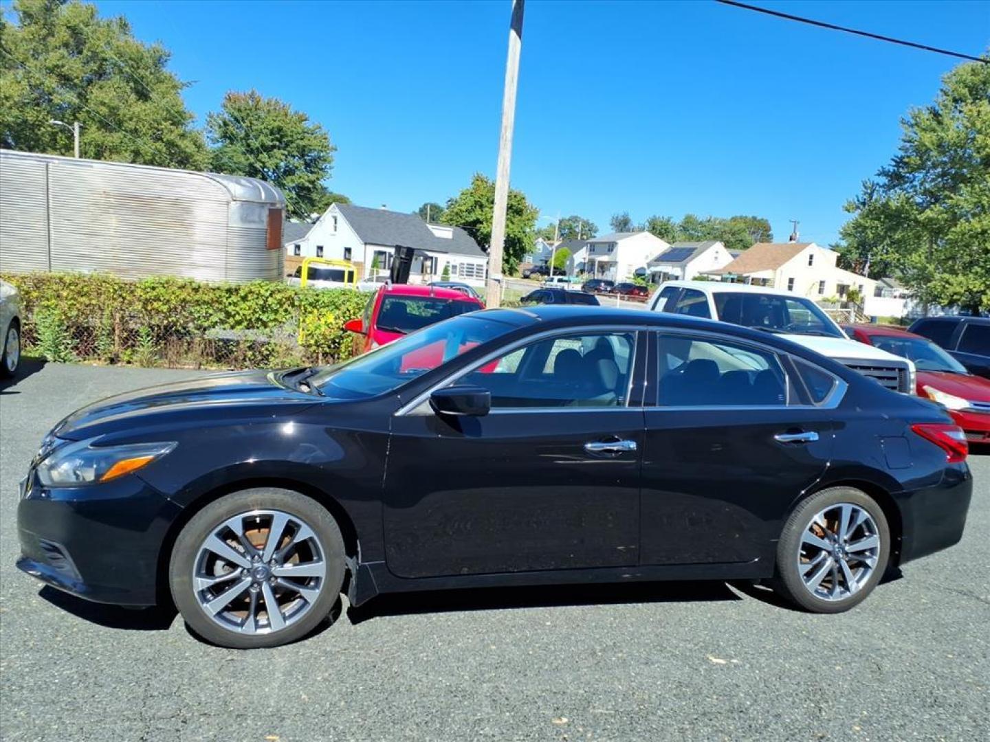 2016 Super Black Nissan Altima 2.5 SR (1N4AL3AP4GC) with an 2.5L 2.5L I4 182hp 180ft. lbs. Sequential-Port F.I. engine, CVT transmission, located at 50 Eastern Blvd., Essex, MD, 21221, (410) 686-3444, 39.304367, -76.484947 - Photo#1