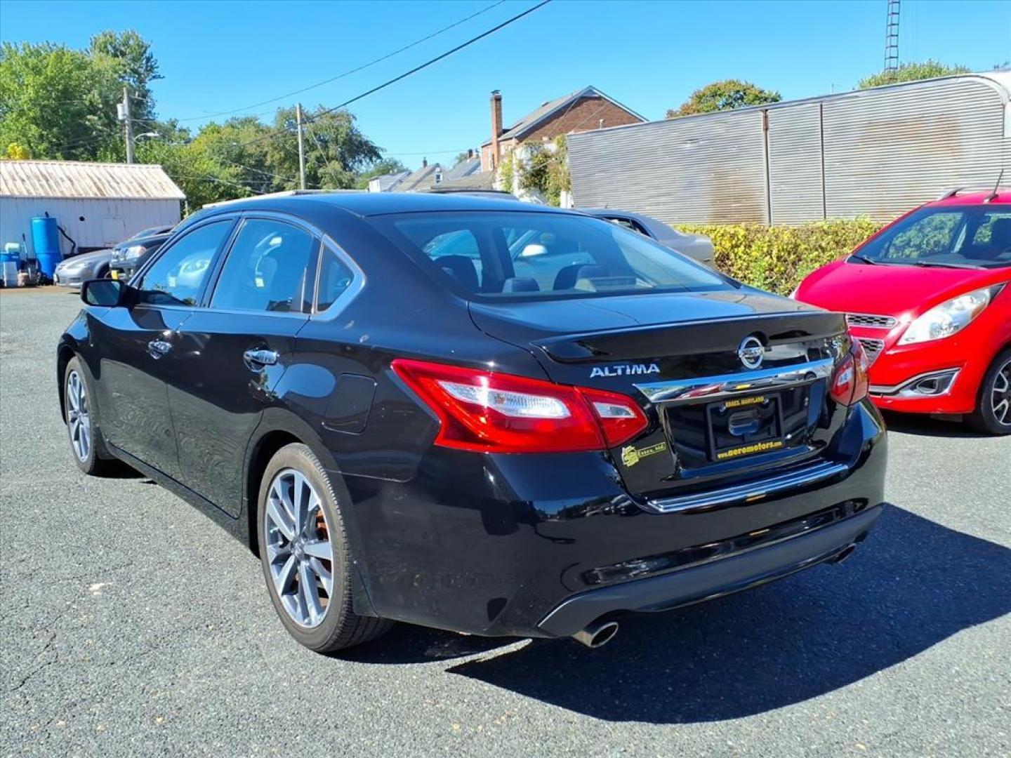 2016 Super Black Nissan Altima 2.5 SR (1N4AL3AP4GC) with an 2.5L 2.5L I4 182hp 180ft. lbs. Sequential-Port F.I. engine, CVT transmission, located at 50 Eastern Blvd., Essex, MD, 21221, (410) 686-3444, 39.304367, -76.484947 - Photo#2