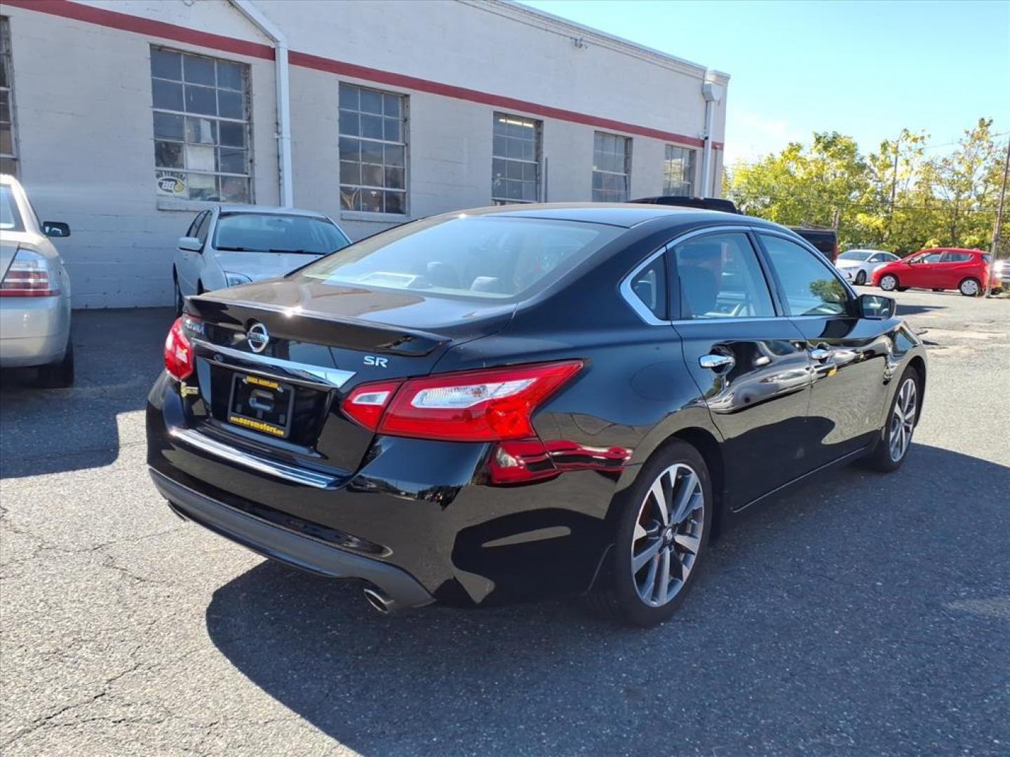 2016 Super Black Nissan Altima 2.5 SR (1N4AL3AP4GC) with an 2.5L 2.5L I4 182hp 180ft. lbs. Sequential-Port F.I. engine, CVT transmission, located at 50 Eastern Blvd., Essex, MD, 21221, (410) 686-3444, 39.304367, -76.484947 - Photo#4